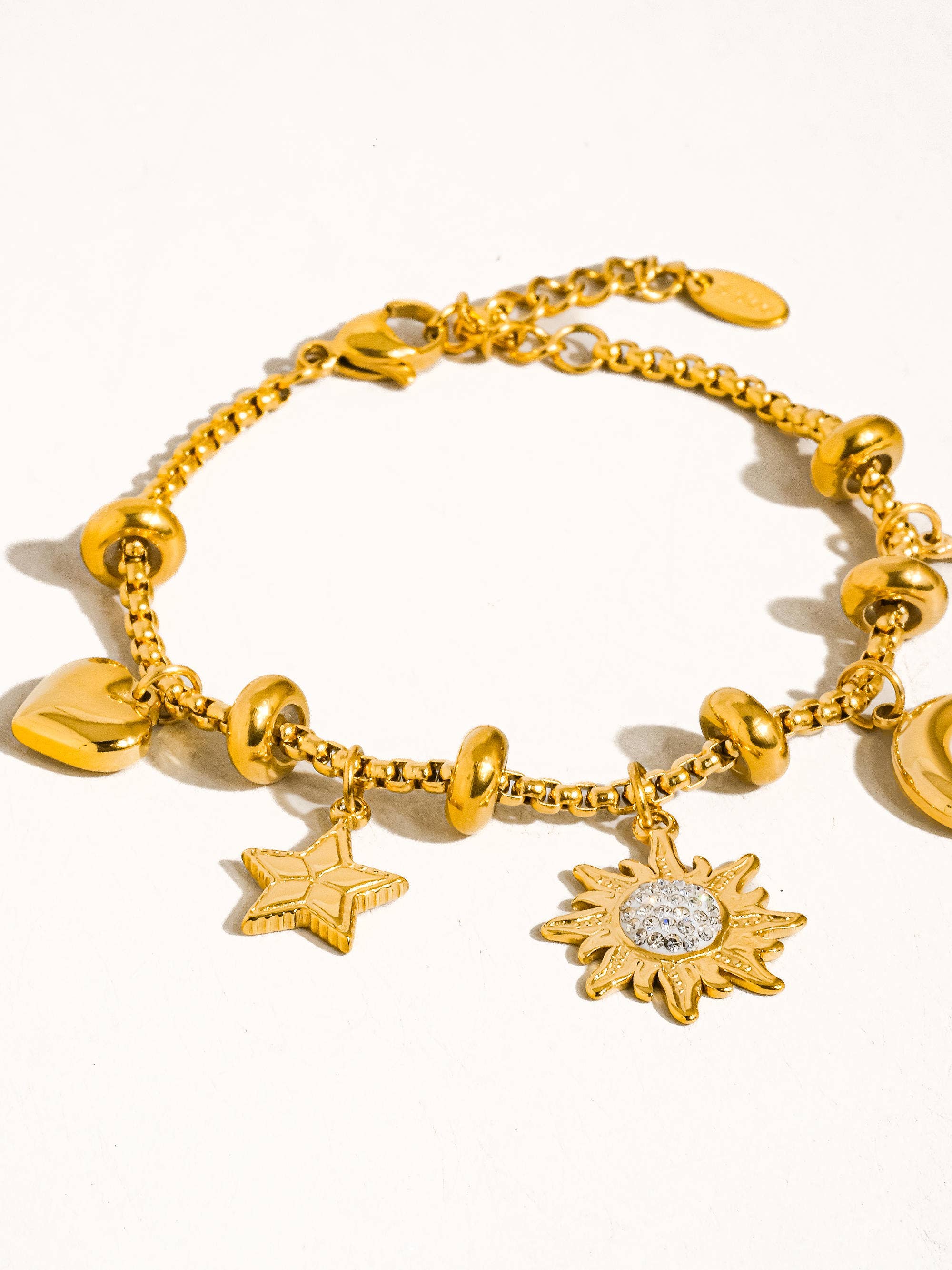 Fenix 18K Gold Non-Tarnish Star And Moon Charm Bracelet for wholesale on Faire3