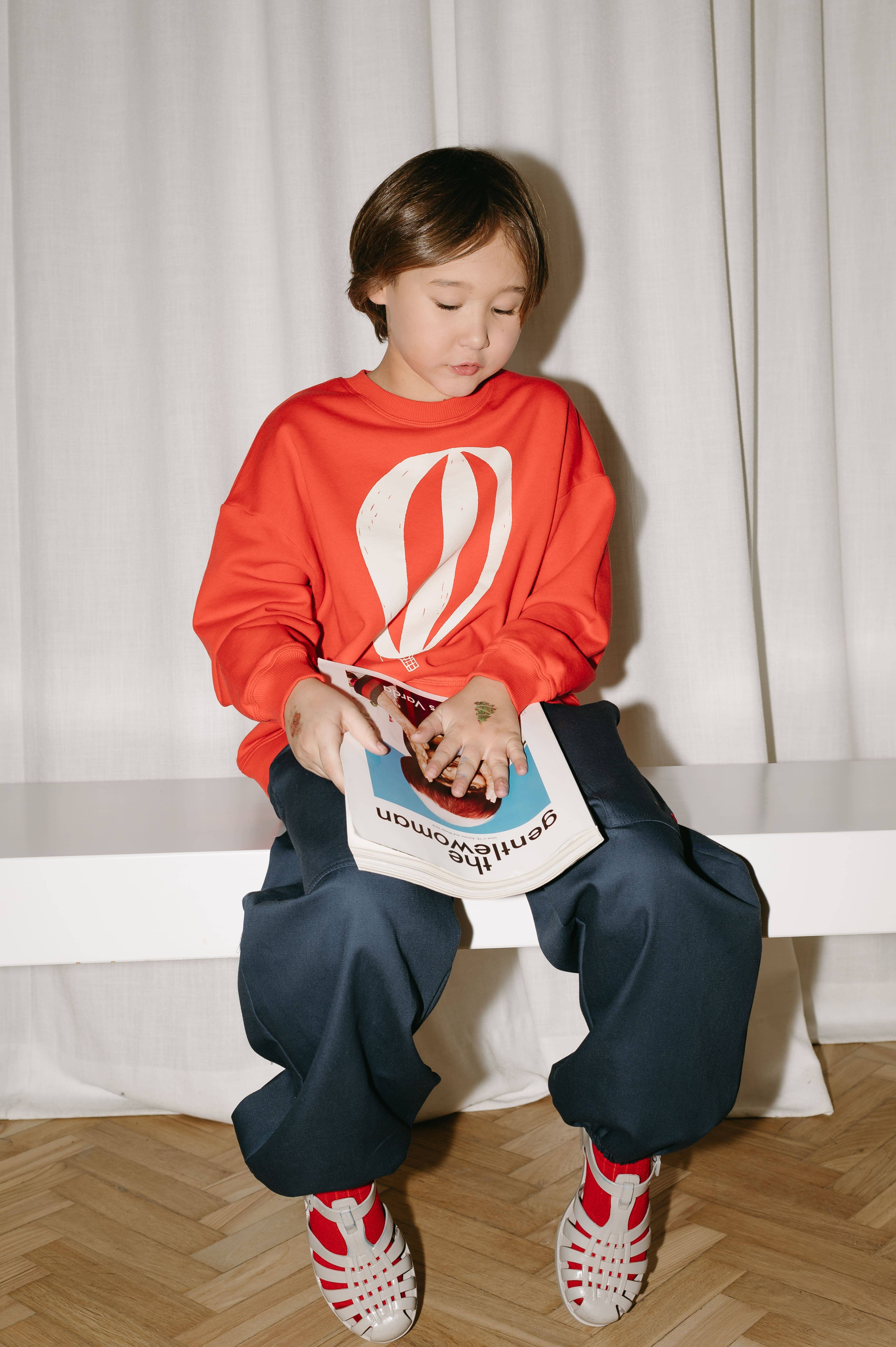 Red ORGANIC COTTON HOT AIR BALLOON SWEATSHIRT for wholesale on Faire3