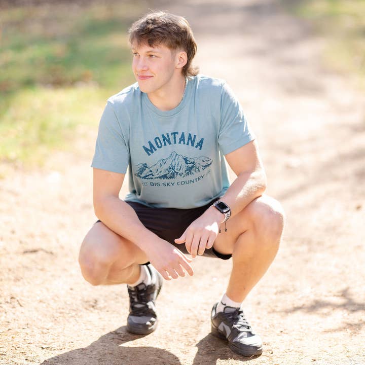 Big Sky Country Tee in Heather Blue Lagoon for wholesale by The Montana Way