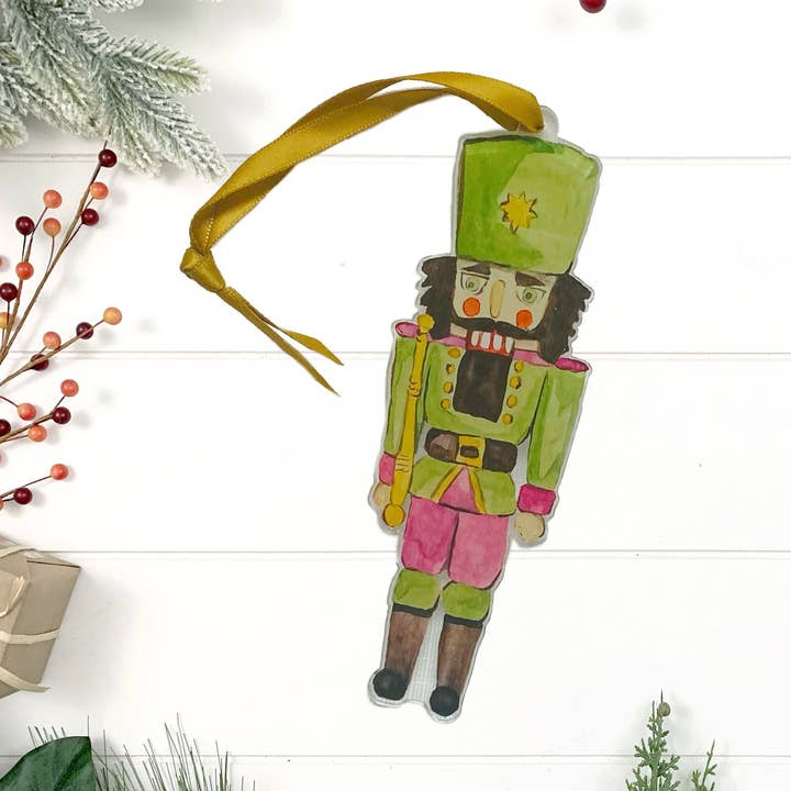 Adorno acrílico con diseño de cascanueces de Mardi Gras para venta al por mayor de Crows Nest Atelier, LLC