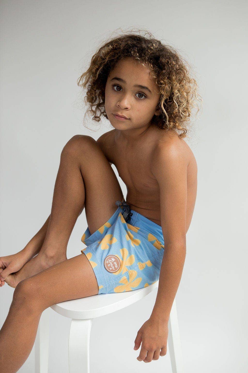 Kid’s Townshort Boardshorts in Light Blue Plumeria for wholesale on Faire6