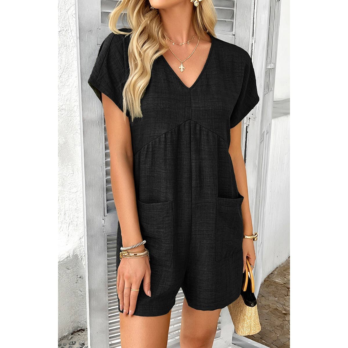 Elings – Großhandel Romper – Damen – Solider Tiefer V-Ausschnitt Drop-Shoulder-Loser Jumpsuit mit Taschen4