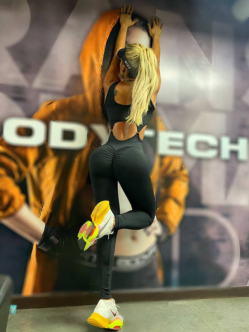 SORT Skinny Belly-Hollow ensfarvet yoga jumpsuits med U-hals for engroshandel på Faire1