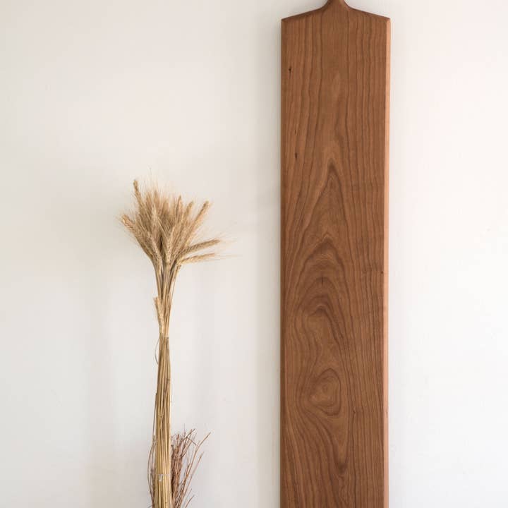 Serving and Cutting Board Mega Monster in Cherry for wholesale by KHEM Studios