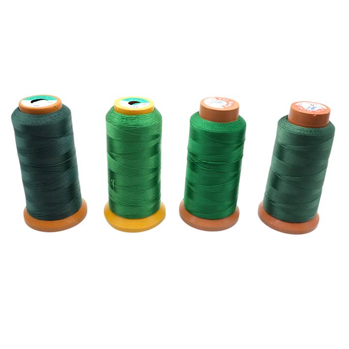 Green thread spool for necklace making for wholesale by Foliesbijoux