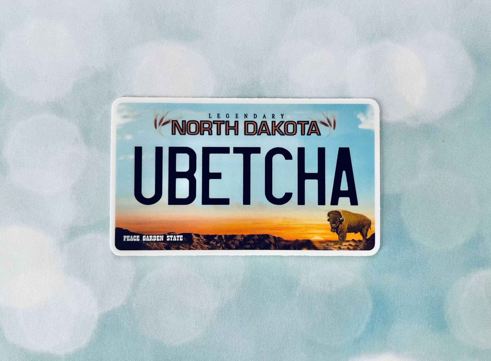 Beckamade - Wholesale Sticker - North Dakota Plate UBetcha  Sticker1