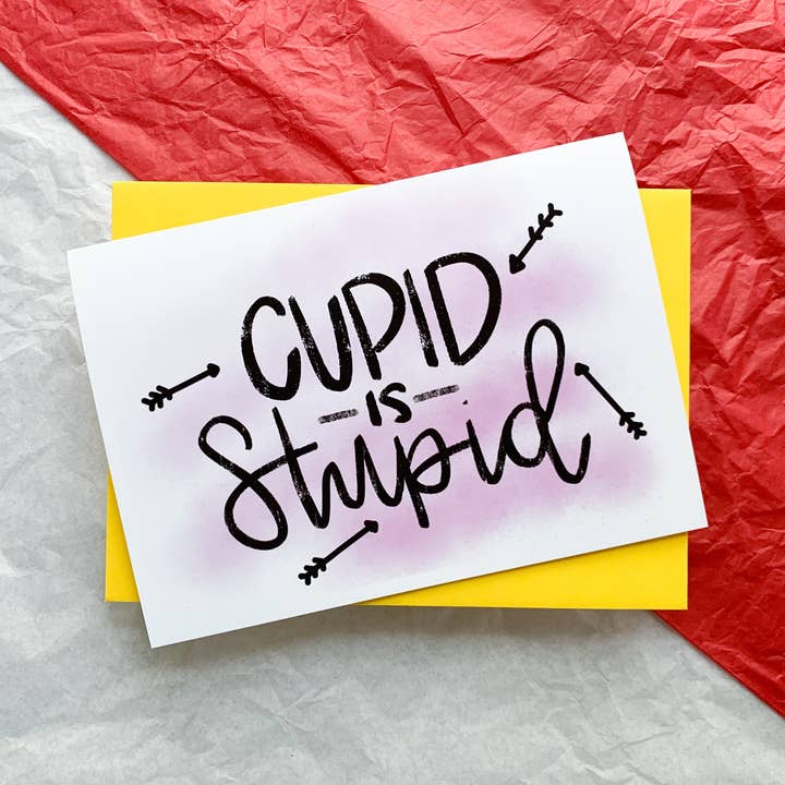 Cupid is Stupid Snarky Handmade AntiValentine Card for wholesale by Stone Donut Design, LLC
