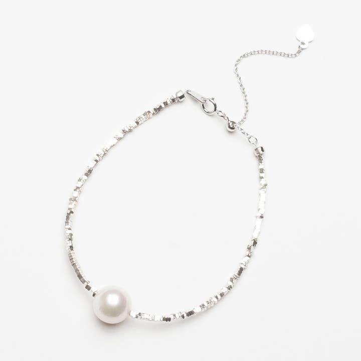 Sterling Silver Disc beaded Bracelet with White Round Pearl for wholesale by Naturagems