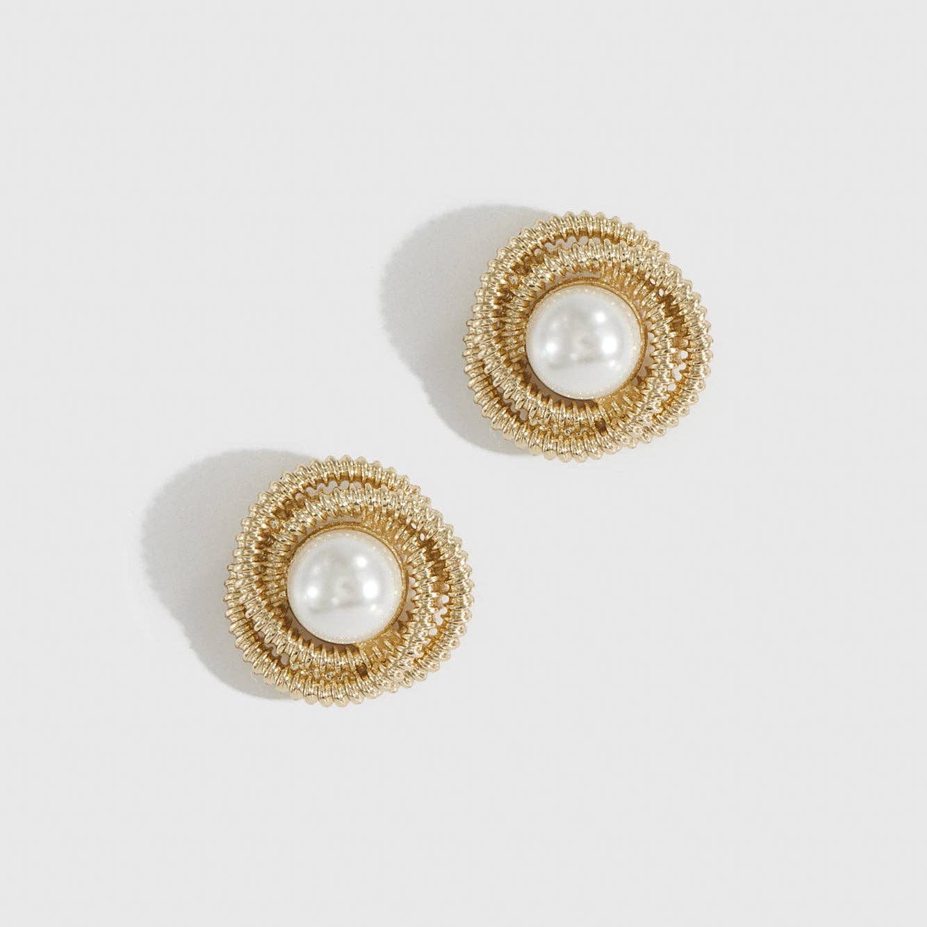 Gold Mini 90's Pearl Stud Earrings for wholesale on Faire0