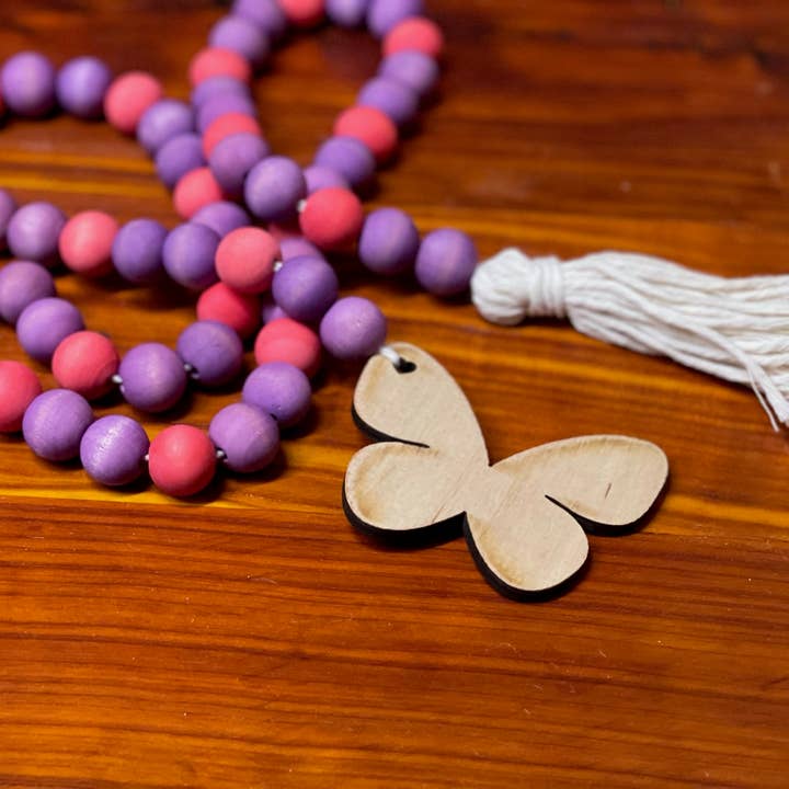 Butterfly roze en paarse slinger voor wholesale door West & Wilkerson