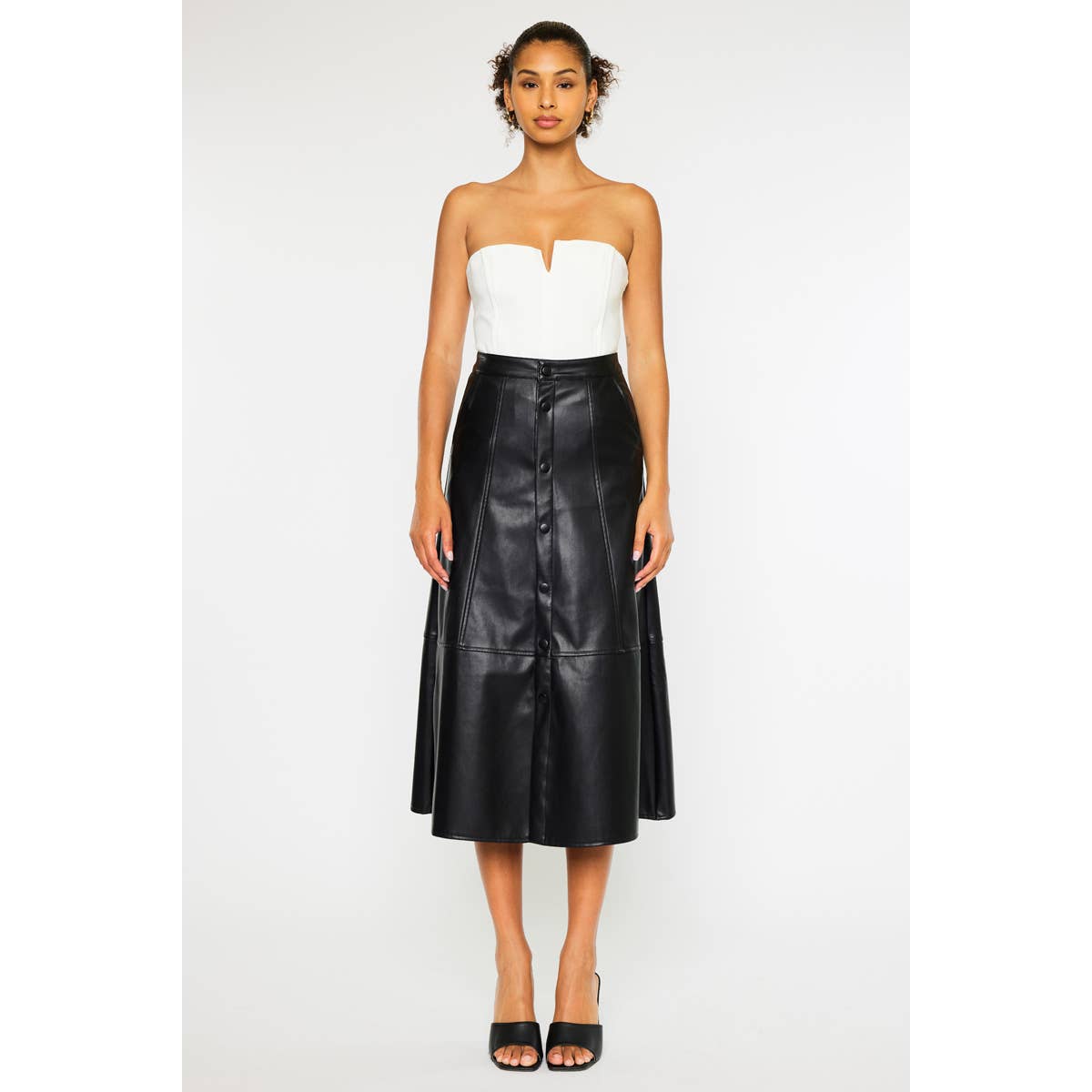 SVART Kan Can USA svart midikjol i PU med hög midja för wholesale på Faire1