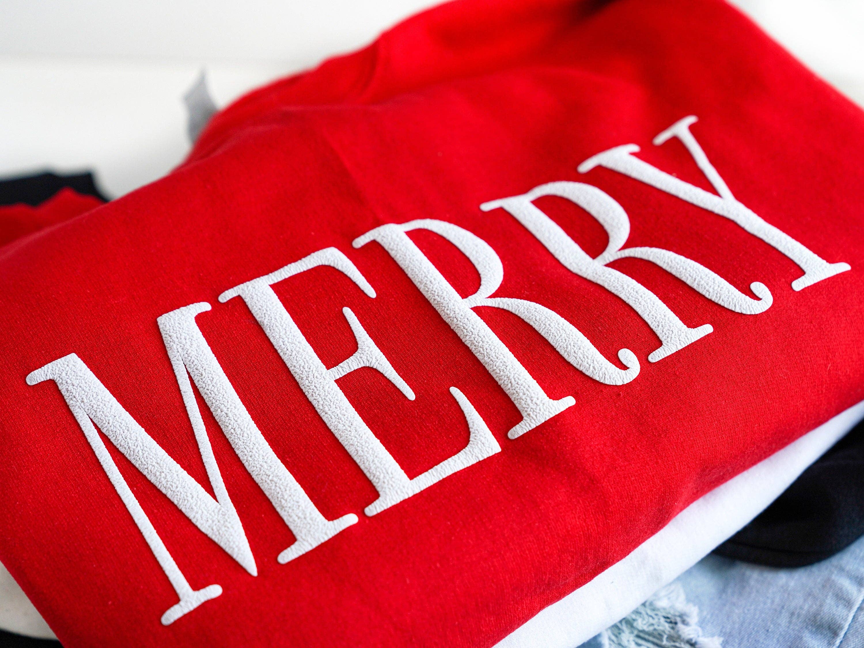 Embossed Red Merry Christmas Crewneck for wholesale on Faire3