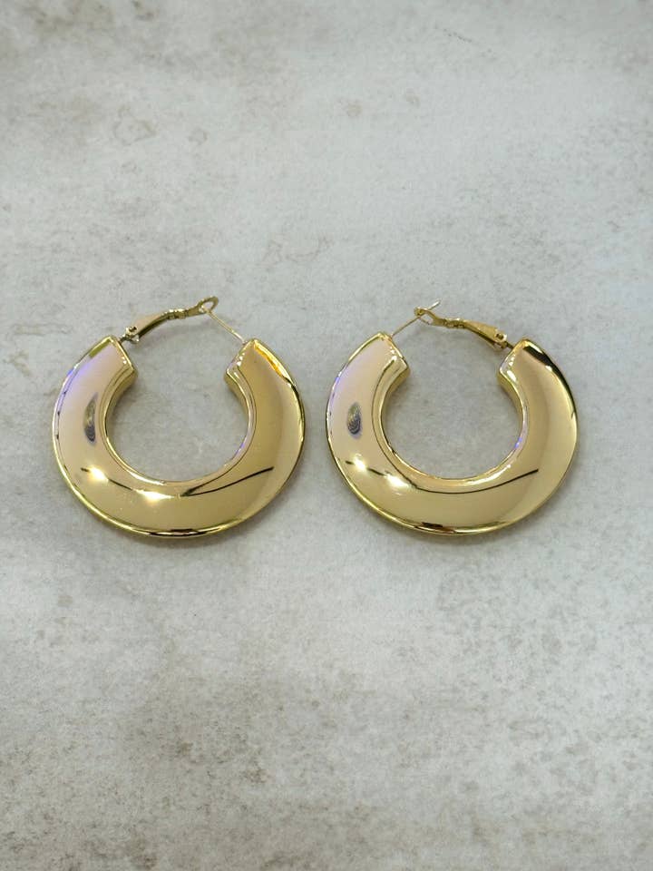 Store UFO-øreringe i bøjleform for engroshandel hos Cassette Barcelona