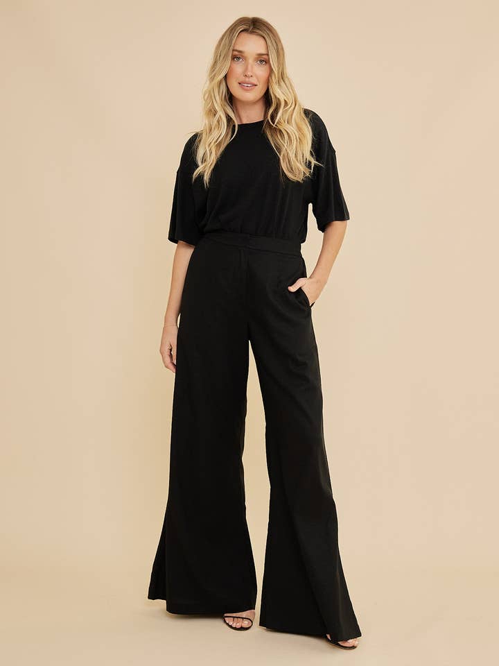 Pantaloni a Gamba Larga Lucie - Nero per la vendita all'ingrosso da parte di Amelius