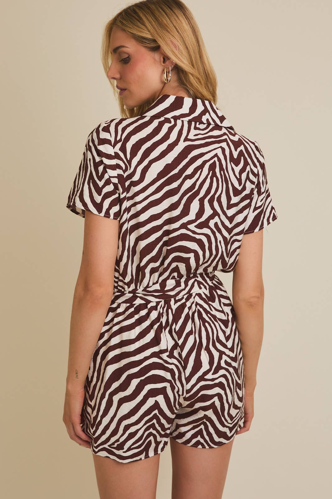 COLLAR BUTTON UP SHORT SLEEVE WAIST TIE ZEBRA ROMPER for wholesale on Faire2