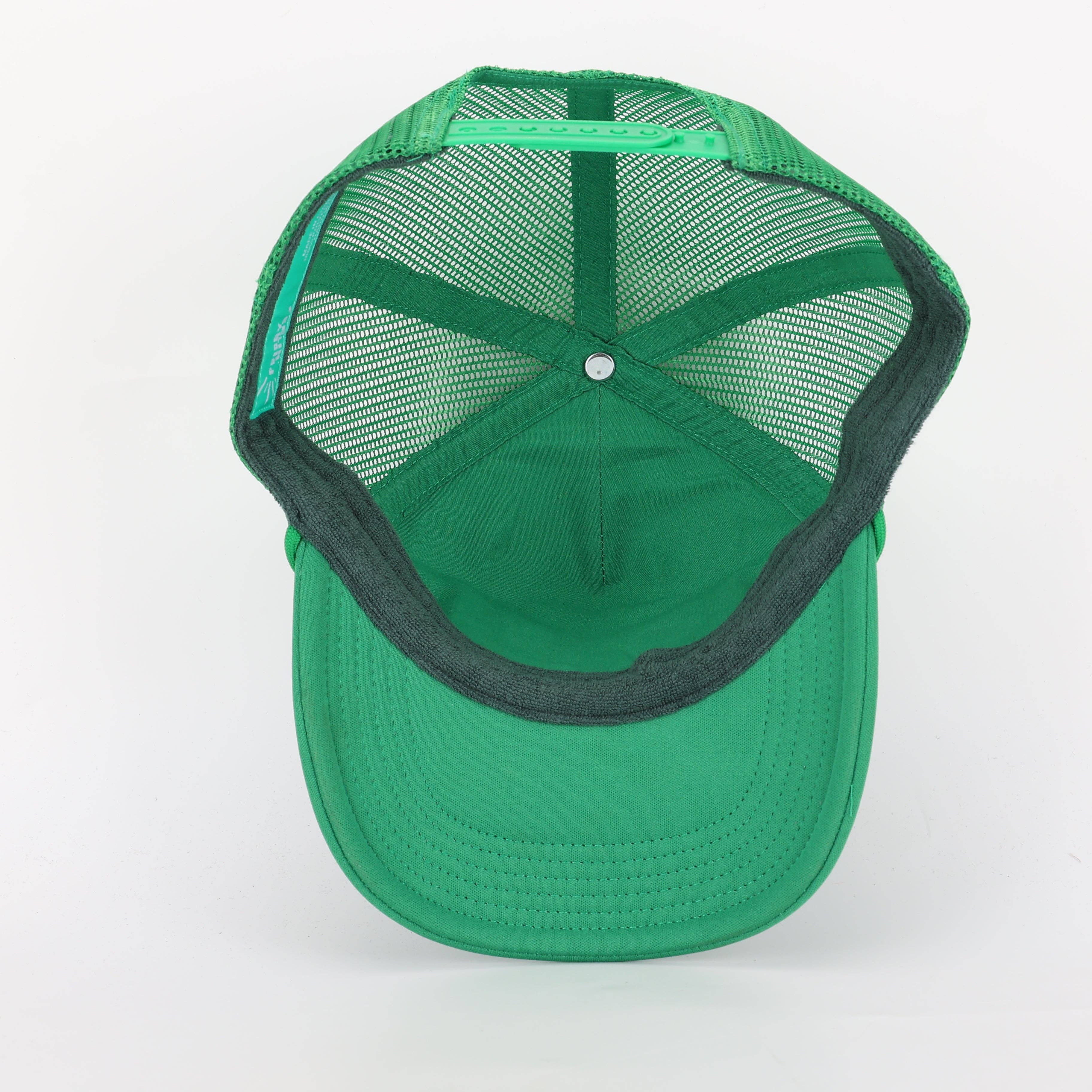 Meet Me Under The Mistletoe Trucker Hat in Green for wholesale on Faire7