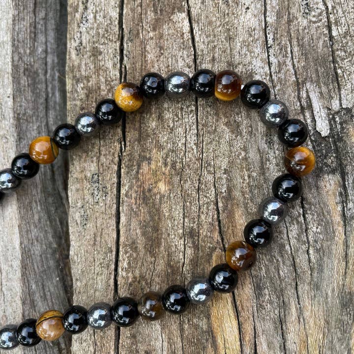 Mala-armbånd med 108 perler »Triple Protection« i Tigerøje, Hematit og Sort Onyx for engroshandel hos Boutique Bohème