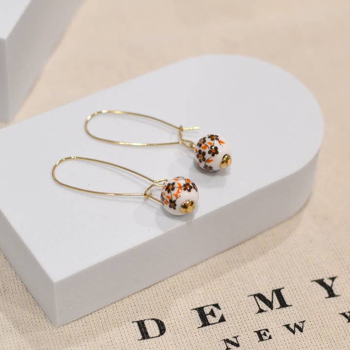 StarryNYC - Wholesale Hangende/ronde oorbellen - Oorbellen van Murano-glas met bolletjes en nierdraad