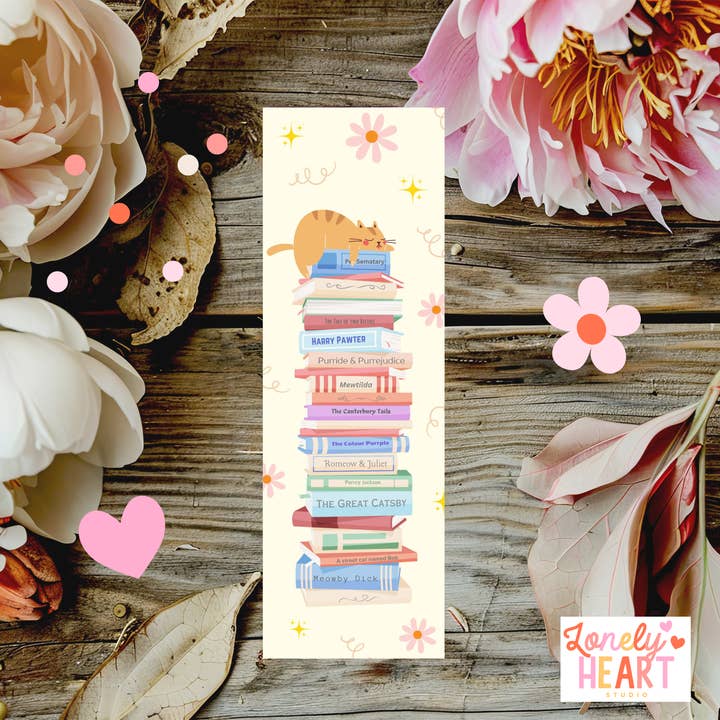 🐾 Cat Book Stack Bookmark – Cute Cat Sitting on Punny Book Titles 📚🐱 for wholesale by Lonely heart studio