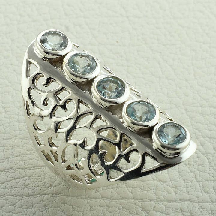 Anello regalo in argento Sterling con topazio blu per la vendita all'ingrosso da parte di Silvex Jewelry