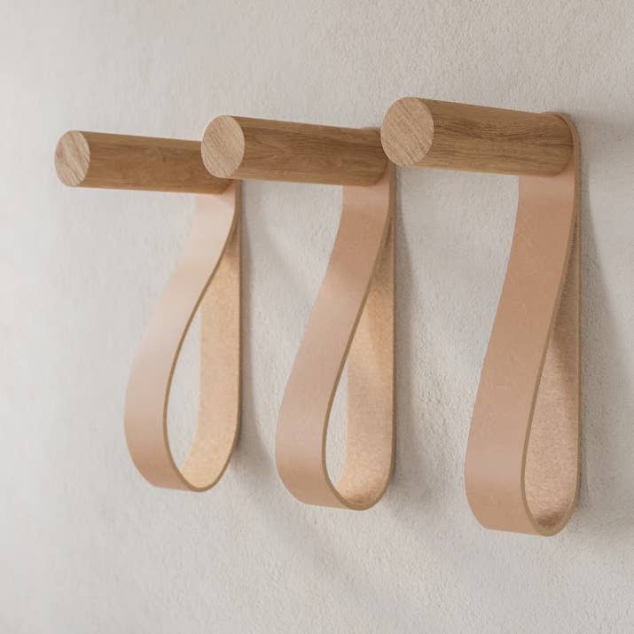 Clothes hanger with leather handle for wholesale by KIVA DESIGN