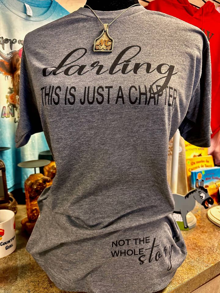 Discover The Darling This Is Just A Chapter Graphic Tee for wholesale by Rowdy Rowels