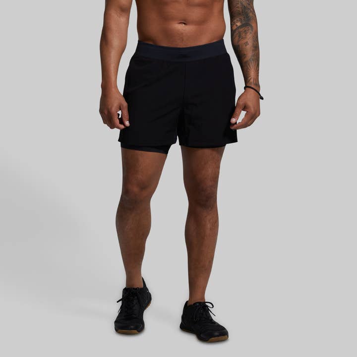 Short polyvalent avec compression de 5 pouces (noir) pour la vente par Born Primitive