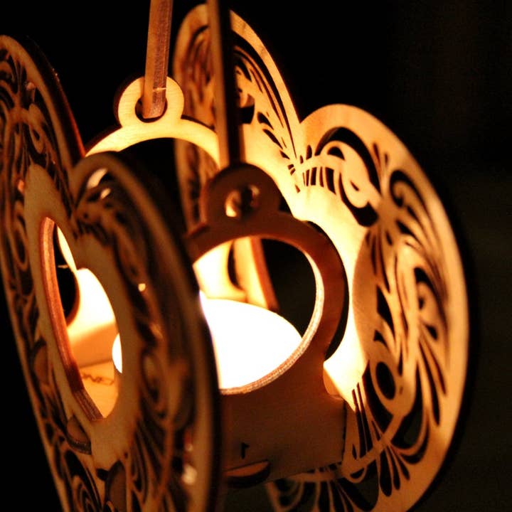 One Man One Garage - Wholesale DIY Craft Kit - Heartstrings, Hanging Tealight Luminaire kits. Natural wood model kit you snap together!