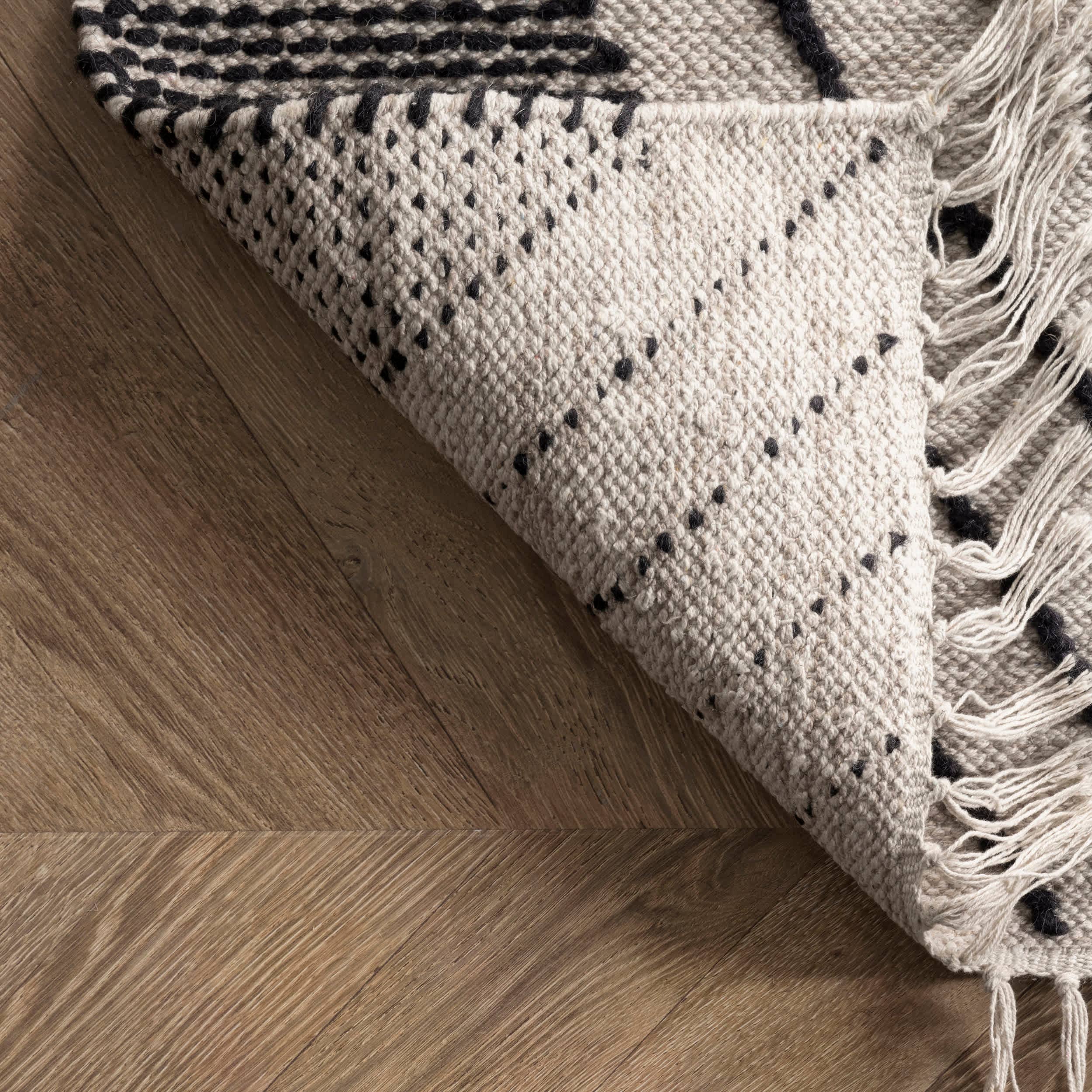 Noir Tapis à pampilles Jubilee en coton et losanges en vente sur Faire5