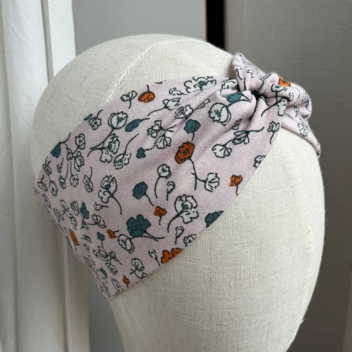 Lyserød blomsterpandebånd for engroshandel hos Les chouchous de Romane