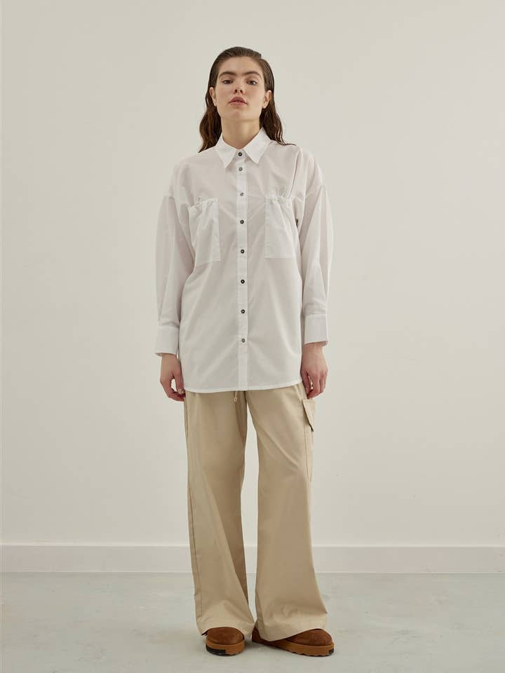 Chemise avec bouchons pour la vente par Vuu