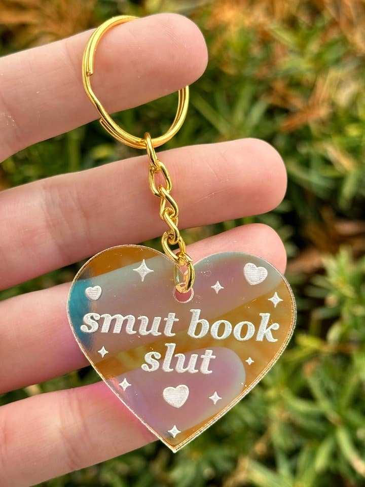 Smut Book Slut Iridescent Acrylic Keychain for wholesale by ShlemonArt