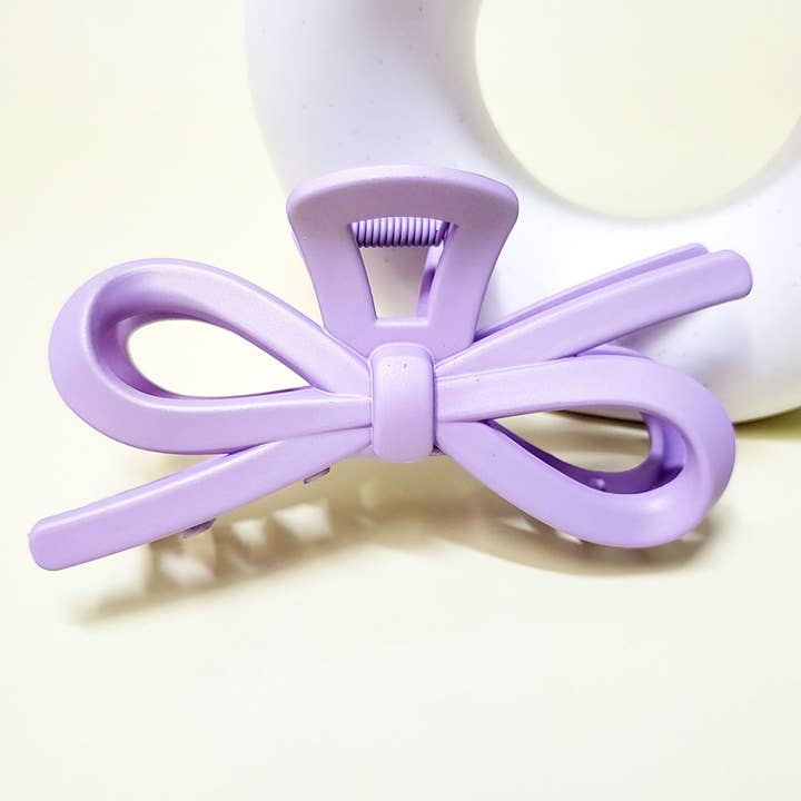 Matte Color Ribbon Shaped Hair Claw Clip for wholesale on Faire