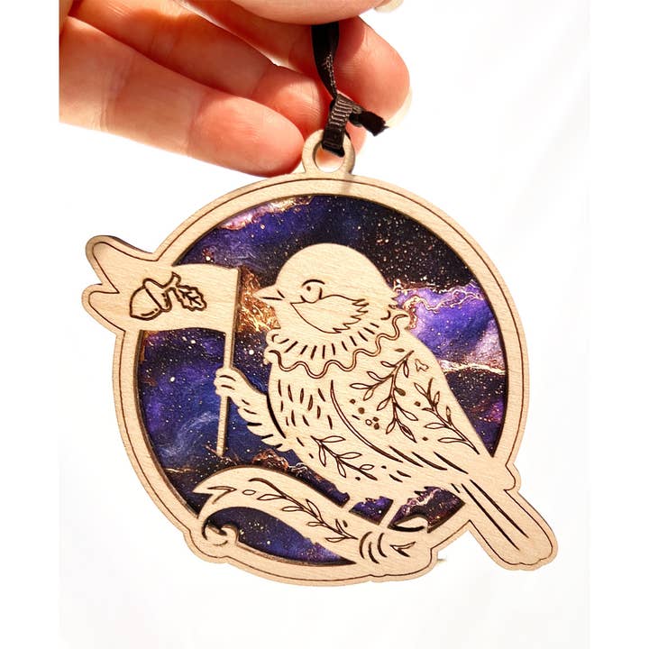 Chickadee Herald Ornament – Woodland Bird Folk Decor for wholesale by Squirrel Tacos Papercuts