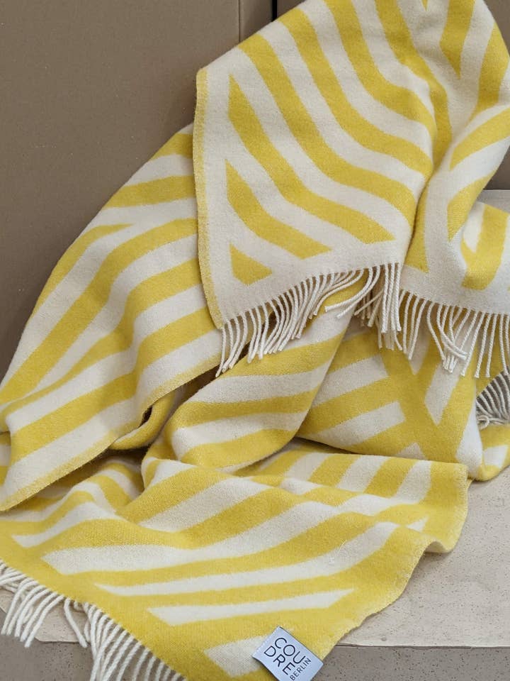 Coperta di lana / Coperta coccolosa FRANK limone / bianco sporco per la vendita all'ingrosso da parte di Coudre Berlin