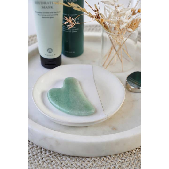 Xander Kostroma - Wholesale Gua Sha Tool - Jade Crystal Gua Sha with Black Skull Pouch
