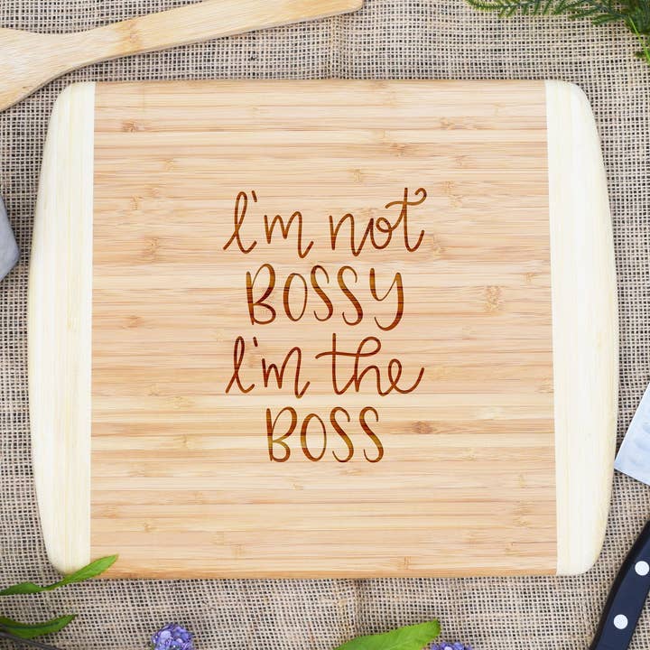 I'm Not Bossy, I'm the Boss - Two Tone Cutting Board for wholesale by Our Board Boutique