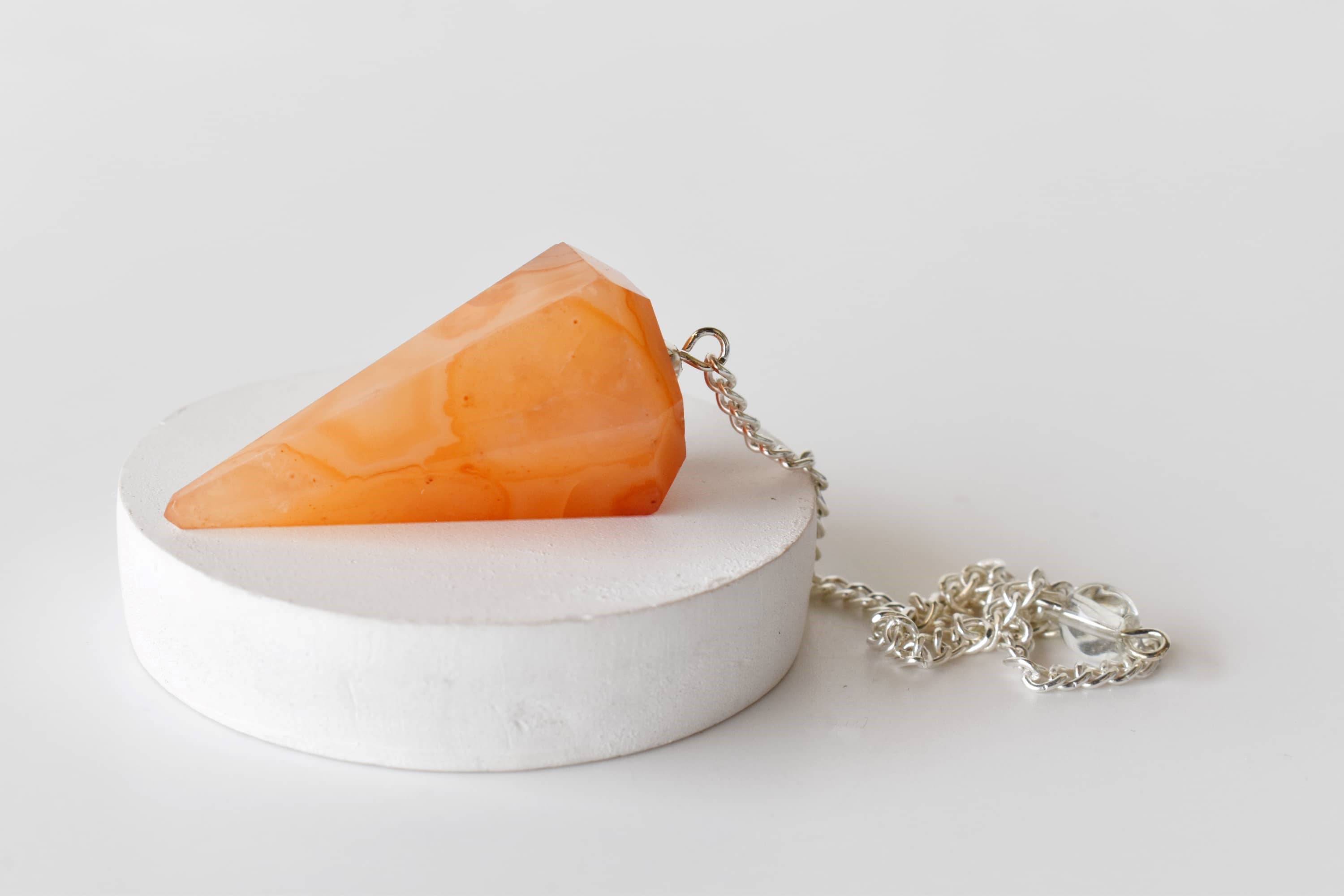 Soothing Crystals - Wholesale Spiritual Stone/Crystal - Dowsing Pendulum | Carnelian | Faceted Crystal Pendulum1