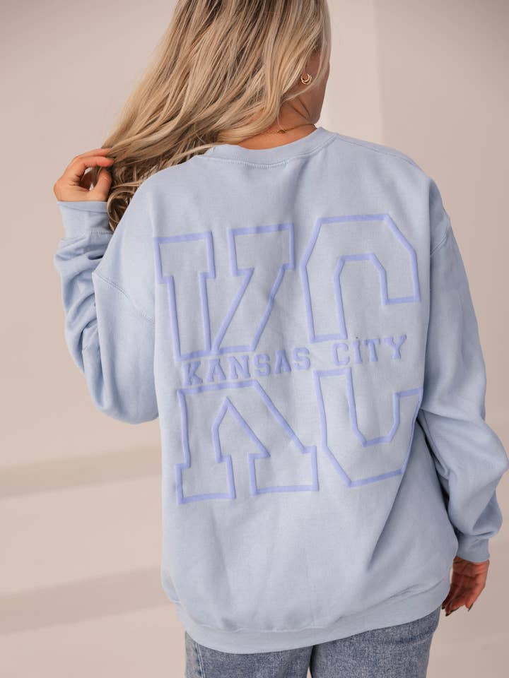 KC Crewneck Sweatshirt (Light Blue) for wholesale by Four Sisters