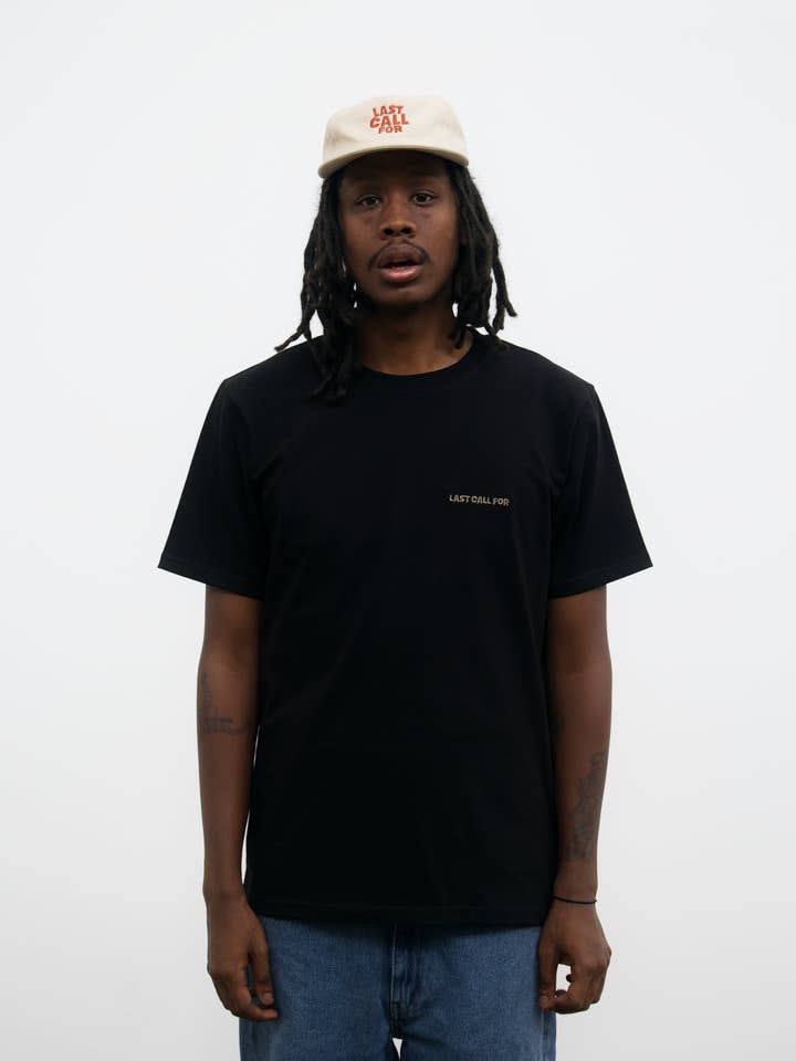 T-shirt nera «Last Call For» in cotone per la vendita all'ingrosso da parte di Last Call For