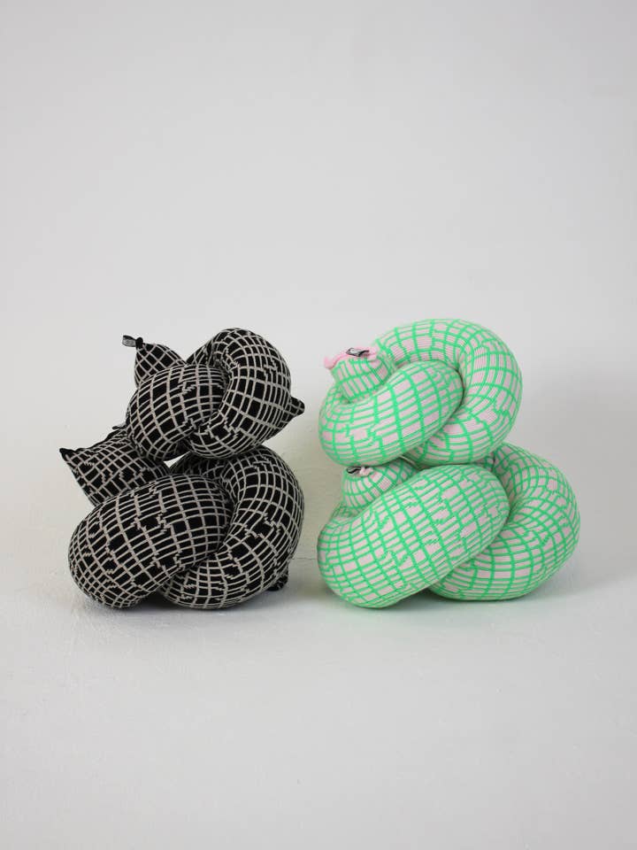 Vanellope Knitted Knot Cushion for wholesale by Zebra Knits