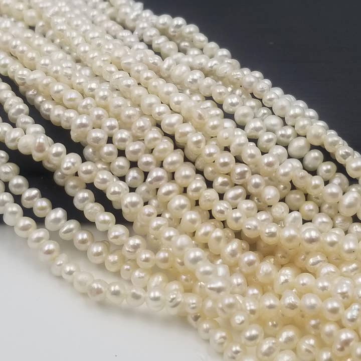 Beads Creation – wholesale Beads – Fresh Water Pearl Center Drill White Nugget Beads PRP3666