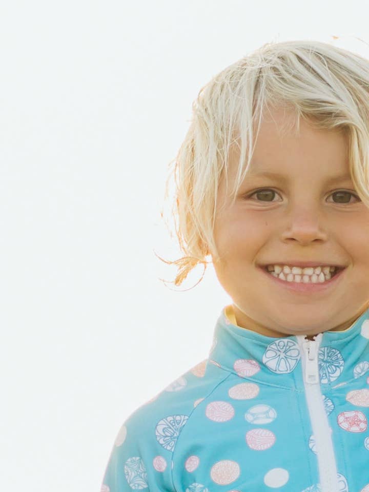 Jo-Jo Sand Dollar Rash Guard for wholesale by King of Redonda