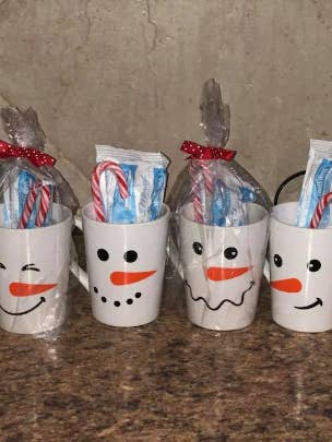 Snowman Mugs for wholesale by Ashleyvinylcreations