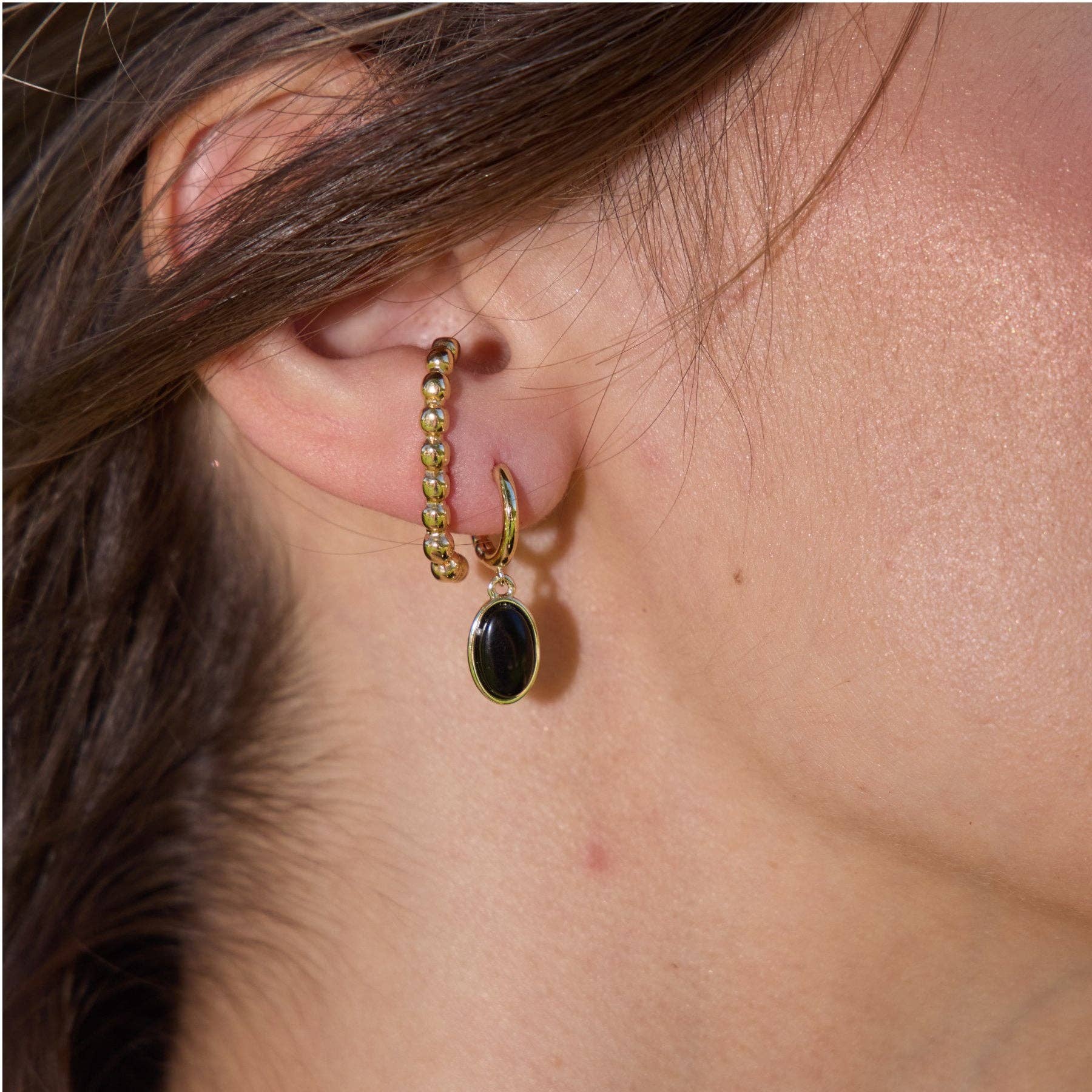 Nickel and Suede – wholesale Huggie earrings – Black Oval Stone Huggies1