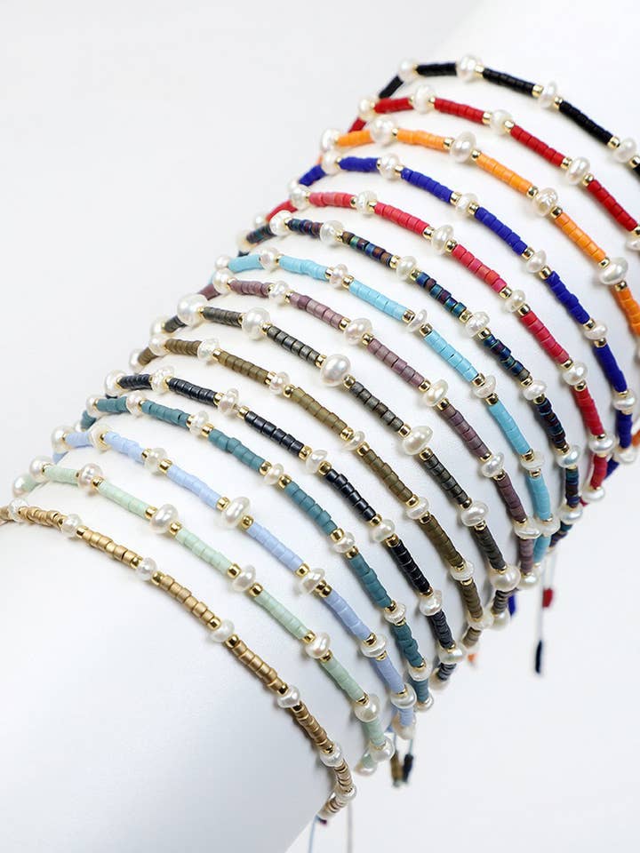 CWAJE4557_HAND-WOVEN FRESHWATER PEARL BRACELET for wholesale by NINEXIS