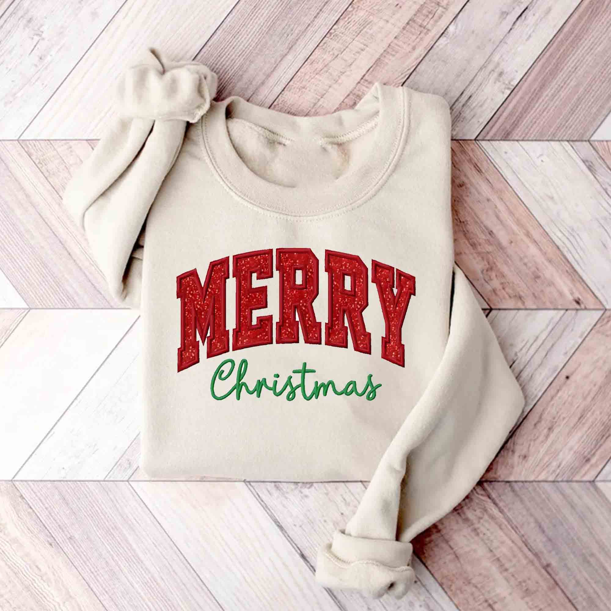 NVC Ecommerce LLC – Großhandel Sweatshirt mit Grafikdruck – Damen – Glitter Merry Xmas Red Bow, besticktes Sweatshirt mit seitlicher Schleife2