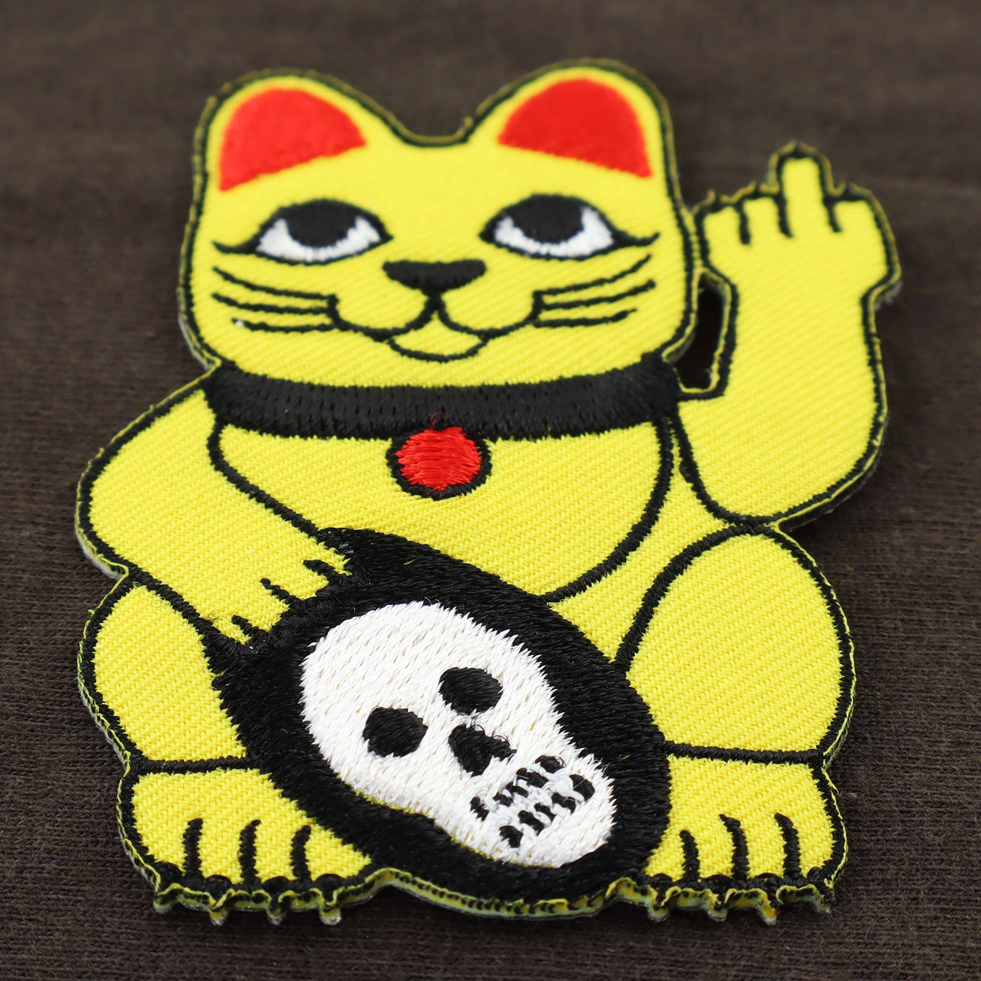 Tribal Trade GmbH - Vente Écusson - Patch Wingkekatze montrant le majeur7