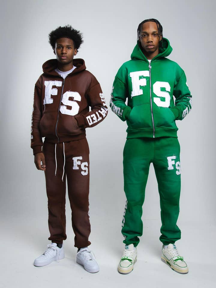 Custom His & Her Tracksuits | Distressed Embroidery and other Purchase Wholesale custom tracksuit. Free Returns & Net 60 Terms on Faire trending on Faire.