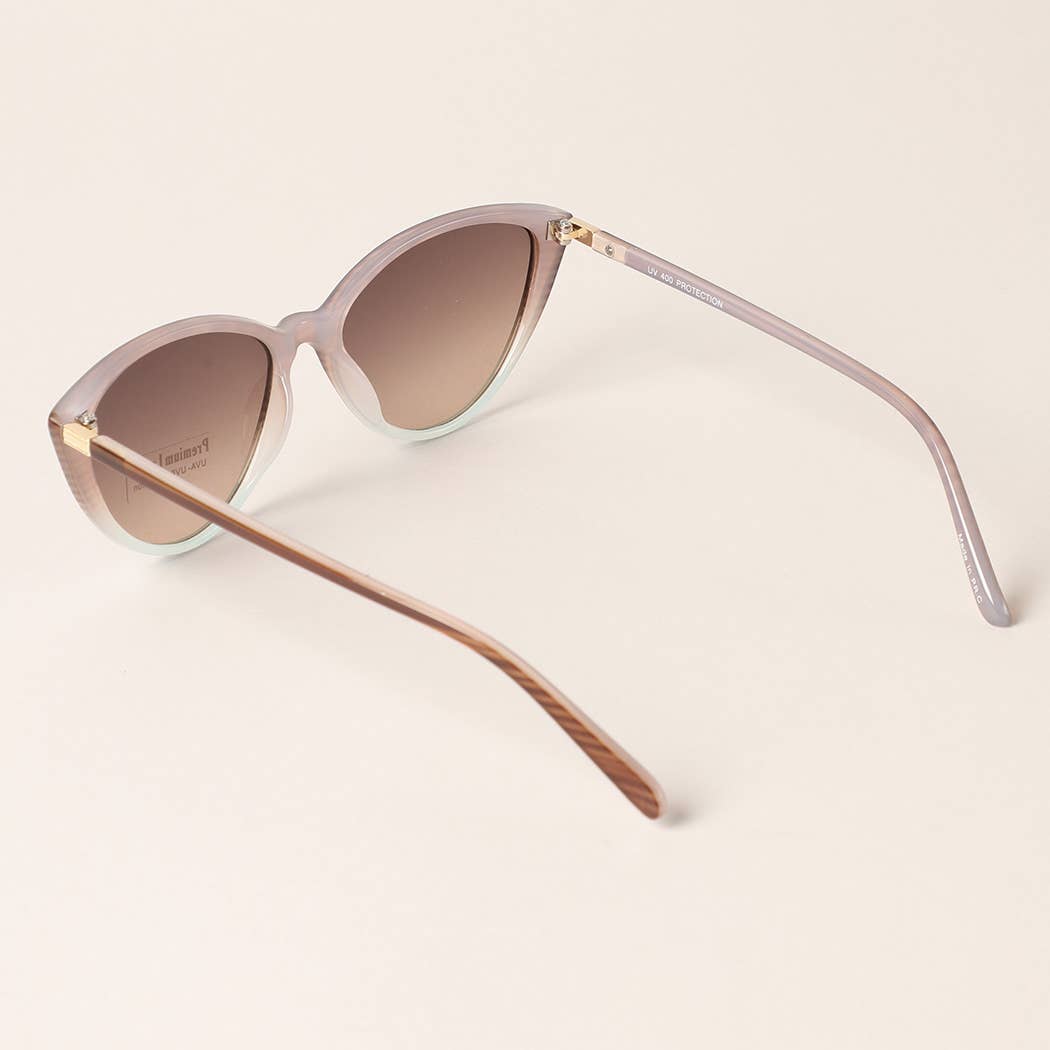 12 COLORI ASSORTITI Occhiali da sole a forma di triangolo Cat Eye con montatura in vendita all'ingrosso su Faire8